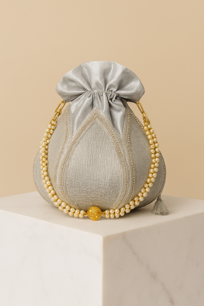 Elegant Silver Potli Bag – Bridal Handbag with Pearl Handle & Crystal Embellishments